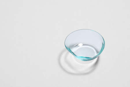 One contact lens on white background, space for textの写真素材