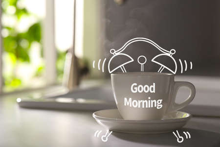 Cup of delicious coffee on kitchen countertop, space for text. good morningの写真素材