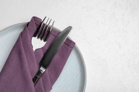 Beautiful table setting on white background, top view. Space for textの写真素材