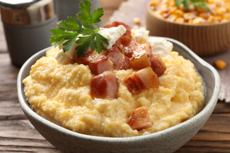 Delicious traditional Ukrainian banosh on wooden table, closeupの写真素材
