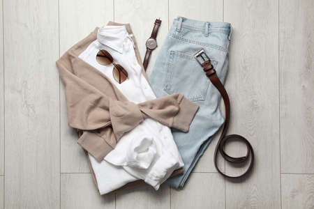 fall fashion. Layout with man's outfit on wooden background, top view