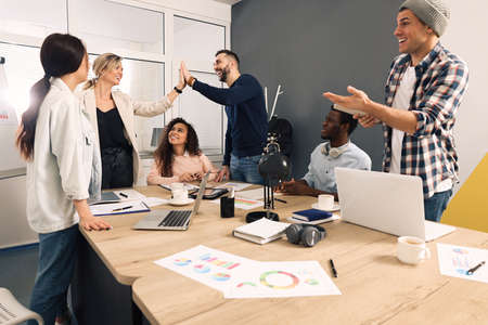 Team of employees working together in office. startup project