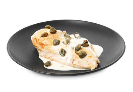 Delicious chicken fillet with capers and sauce isolated on whiteの写真素材