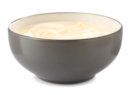 Mayonnaise in ceramic bowl isolated on whiteの写真素材