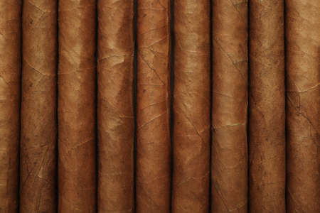 Close up of many cigars as background, top view
