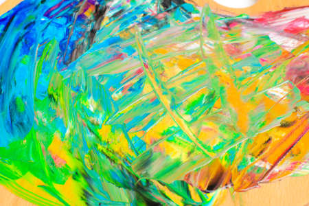Abstract colorful acrylic paint as background, top viewの写真素材