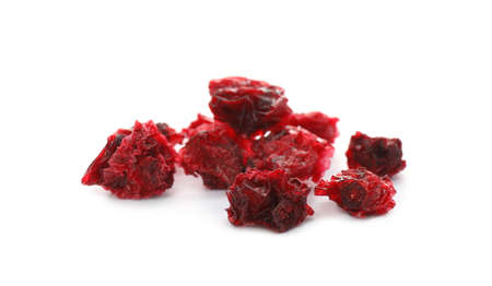 Pile of dried red currants on white backgroundの写真素材