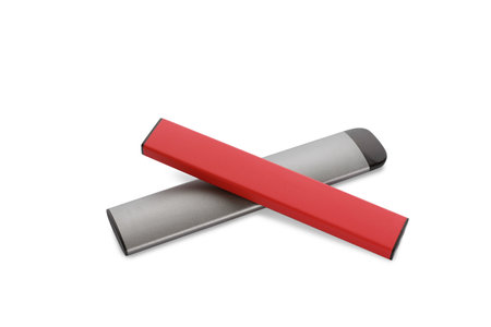Two disposable electronic cigarettes on white background