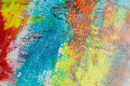 Strokes of colorful acrylic paints on canvas, closeupの写真素材