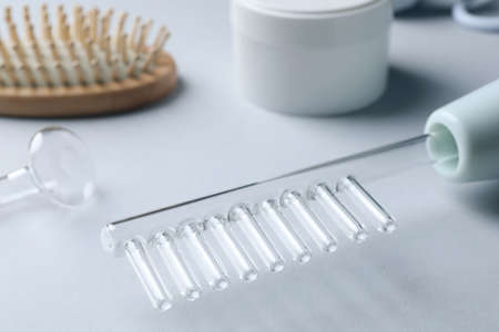 Darsonval on white table, closeup. modern device