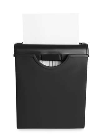 Shredder with sheet of paper isolated on whiteの写真素材