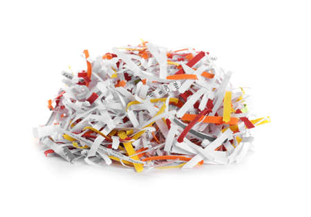 Many shredded paper strips on white background