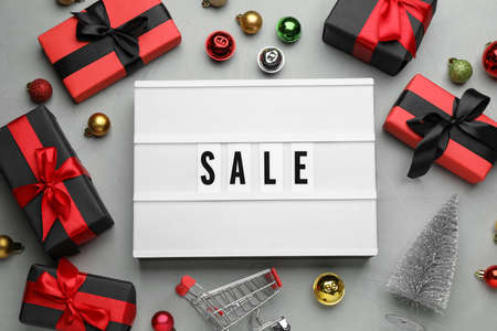 Flat lay composition with word Sale on gray backgroundの写真素材