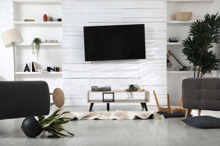 Chaotic living room interior after strong earthquakeの写真素材