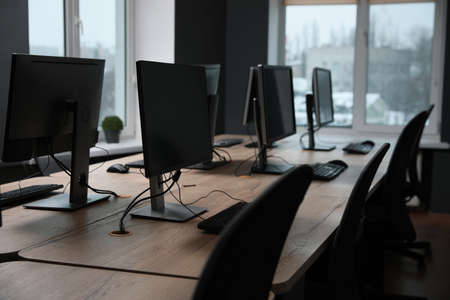 Many modern computers in open space officeの写真素材