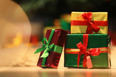Beautiful Christmas gifts on the floor in the room