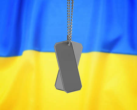 Military ID tags and Ukrainian flag on backgroundの写真素材