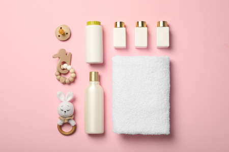 Flat lay composition with baby cosmetic products on pink backgroundの写真素材