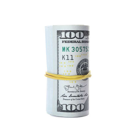 Rolled dollar banknotes on white background. american national currency