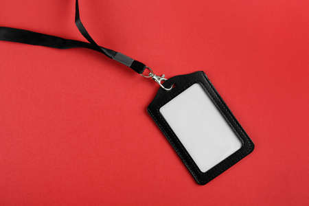Blank badge on red background, top view. Mockup for designの写真素材