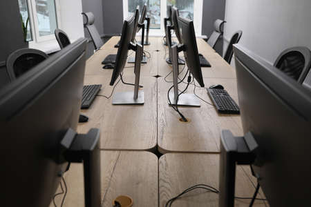 Many modern computers in open space officeの写真素材