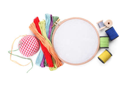 Set of embroidery equipment on white background, top view