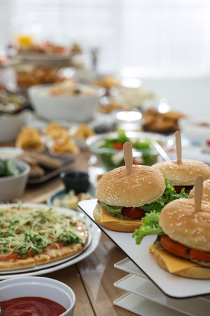Brunch table setting with different delicious food indoorsの写真素材