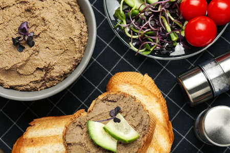Flat lay composition with delicious liver pate on napkinの写真素材