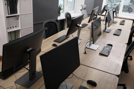 Many modern computers in open space office