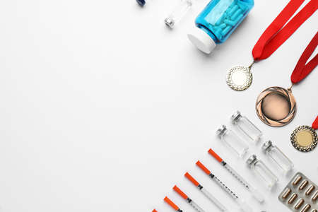 Flat lay composition with drugs on white background, space for text. doping controlの写真素材