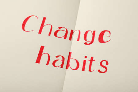 Paper sheet with text Change Habits, closeupの写真素材