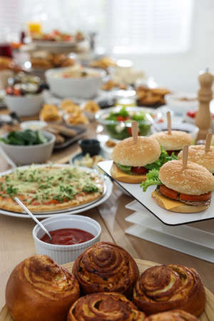 Brunch table setting with different delicious food indoors