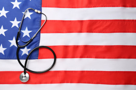 Stethoscope on American flag, top view. Space for textの写真素材