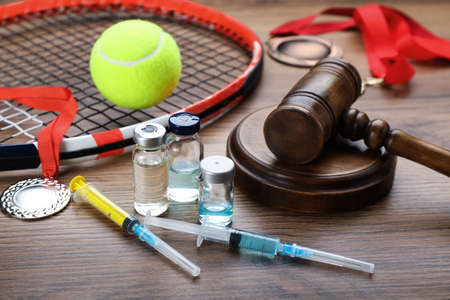 Composition with drugs on wooden table. doping control