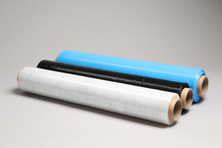 Rolls of different stretch wrap on light gray backgroundの写真素材