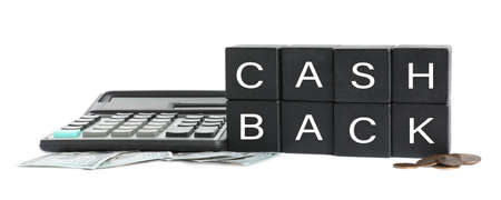 Black cubes with word Cashback, money and calculator on white backgroundの写真素材