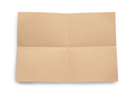 Sheet of brown paper on white background, top view