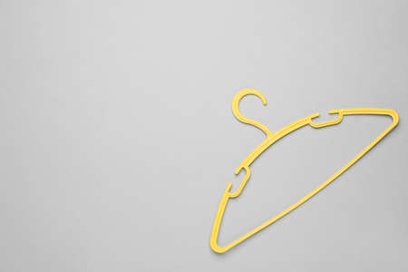 Empty clothes hanger on white background, top view. Space for textの写真素材