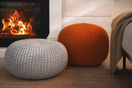 Stylish comfortable poufs in room. Home designの写真素材