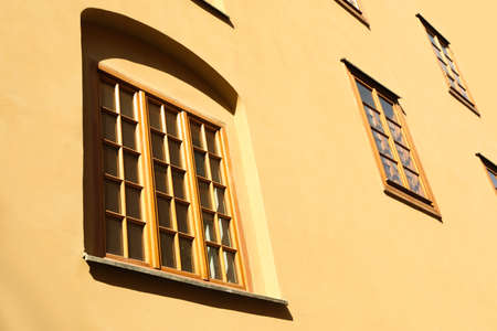 Building with windows on sunny day, view from outdoors