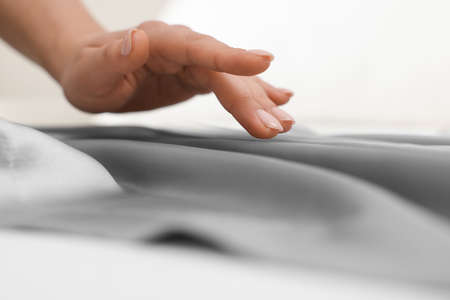 Woman touching smooth silky fabric, closeup viewの写真素材