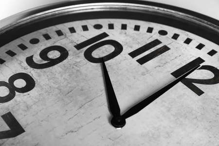 Stylish analog clock on white background, closeup