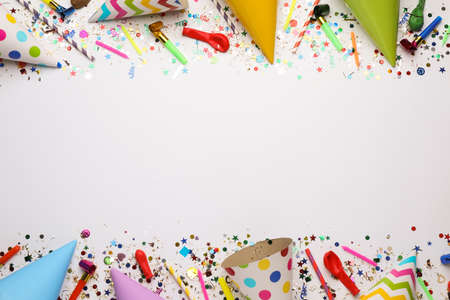 Beautiful flat lay composition with festive items on white background, space for text. Surprise...