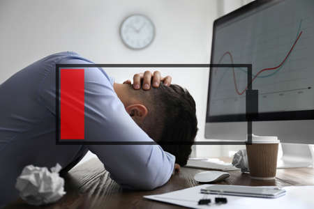 Illustration of discharged battery and tired man at workplace in office. extreme fatigueの写真素材