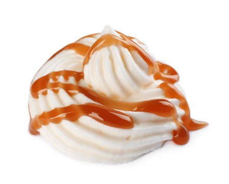 Delicious fresh whipped cream with caramel sauce isolated on whiteの写真素材