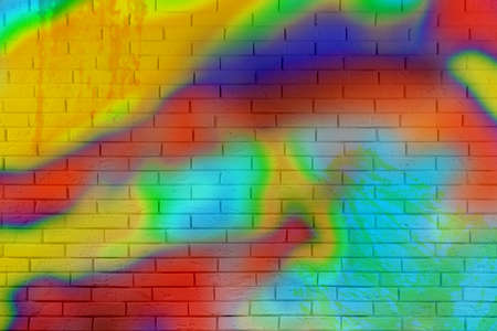 Abstract colorful graffiti drawn on brick wallの写真素材