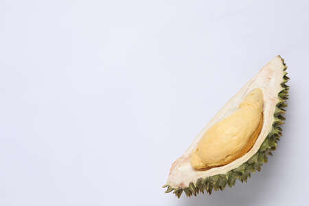 Piece of fresh ripe durian on white background, top view. Space for textの写真素材