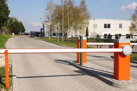 Orange road barriers outdoors on sunny day