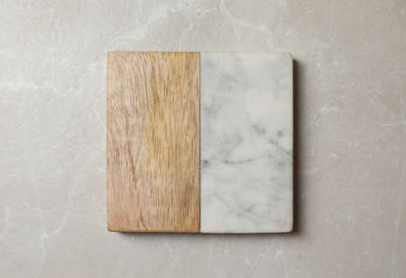 Stylish cup coaster on light gray table, top view