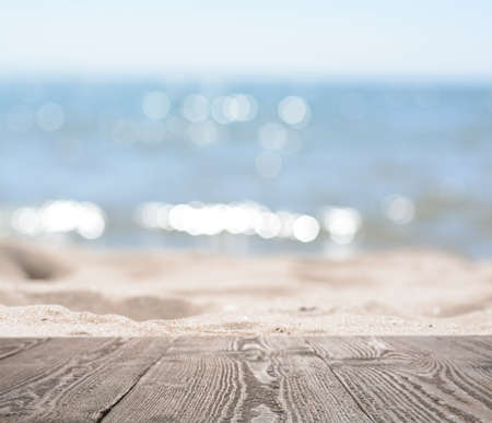 Empty wooden surface on the beach near the sea. summer seasonの写真素材